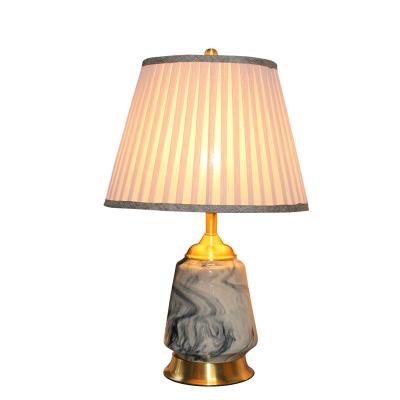 China Modern Chinese Classical Copper Bedside Low Shade Cloth Fabric Bedroom Hot Selling Ceramic Table Lamp for sale