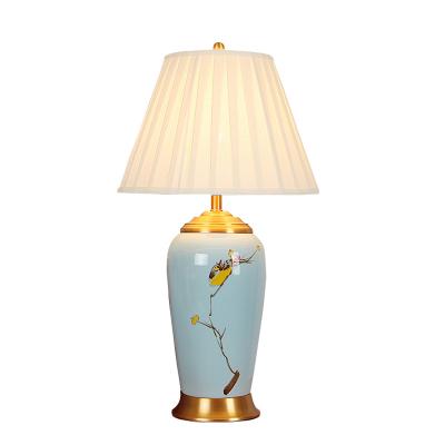 China Chinese classic warm hotel home Chinese style ceramic table lamp led bedroom living room table lamp for sale