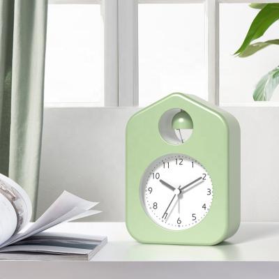 China 2021 modern NEW ticking of the non-silent alarm clock with simple night light bell house shape alarm clock for sale