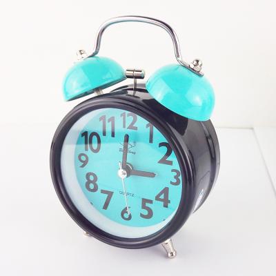 China Antique Style 3 Inch Metal Double Bell Alarm Clock With Light And Coloful Back for sale