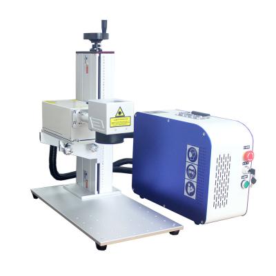 China Water Cooling Factory Price Portable 355nm UV Laser Marking Machine Small Laser Carving Plastic Leaves Glass Bottles en venta