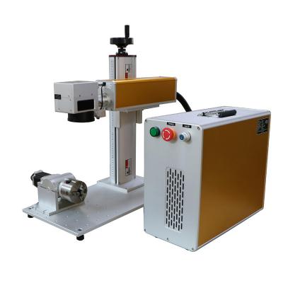 China Kleine CNC Laser-Graviermaschine/Tischplatten-Handlaser-Graveur zu verkaufen