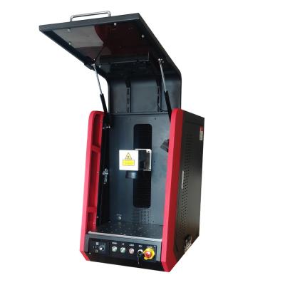 China Enclosed Auto Focus 50W Fiber Laser Marking Machine for sale