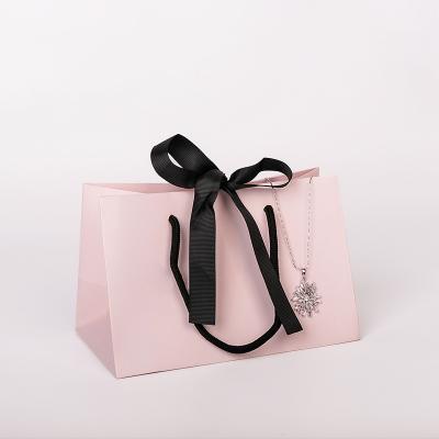 China Wholesale Reusable Luxury Recyclable Manufacturer Gift Paper Bag With Ribbon Handle for sale