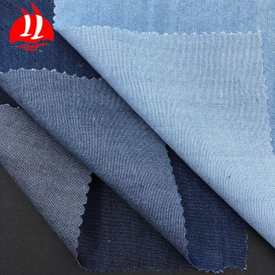 China Plain indigo dyed 100% denim tencel fabric for jeans for sale