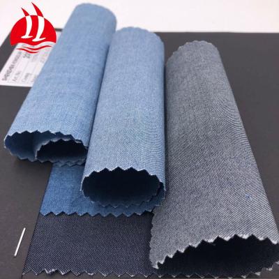 China Cheapest stocklot anti static wholesale denim fabric washed for sale