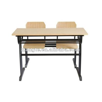 China Classroom Cozy Double Table Cozy Detachable School Desk With Book Storage Basket for sale