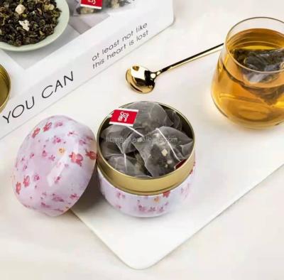 China Tea Drinks Fruit Herbal Tea Flower Mesh Filter Empty Pyramid Tea Anti Aging Bags With String For Tea Packaging for sale