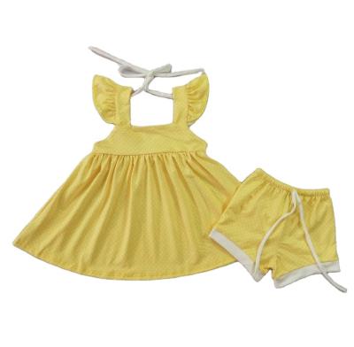 China Formal Wholesale Yellow Polka Dot Printing Fabric Custom Girls Clothing Set Outfit for sale