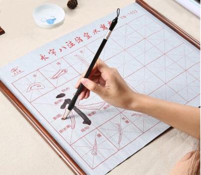 China Home Decorations.Gifts Brand New Environmentally Friendly Reusable Water Calligraphy Cloth Roll Water Writing Quick Dry Joint Cloth for sale