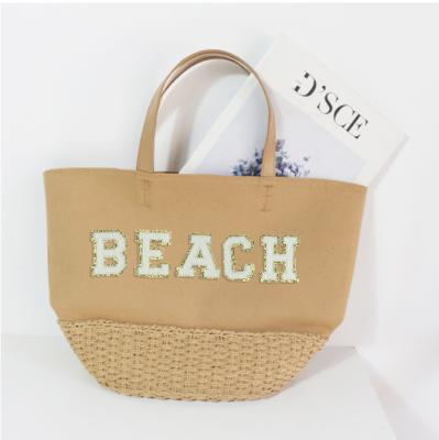 China Women Straw Woven Travel Bag Large Capacity Square Canvas Bag Portable Lady Bag Straw Ins New Style Beach for sale