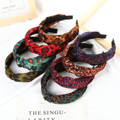 China New Fashion Trend Ladies Cross Headband Fashion Leopard Print Middle Knot Headband for sale