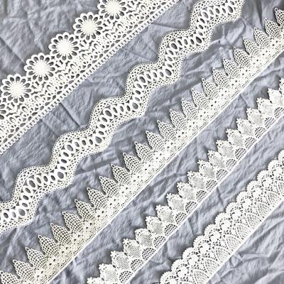 China Latest Bridal Wedding Polyester Embroidery Silk Lace Fabric Viable White Milk Lace For Women Clothes for sale