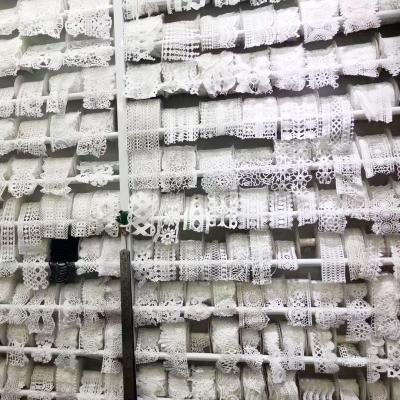 China Last Viable Bridal Wedding Lace Fabric Polyester Embroidery Milk Yarn White Lace for sale