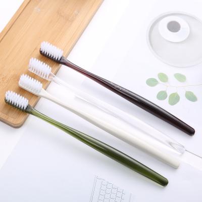 China Good Selling Translucent Candy-Colored Handle Adult Toothbrush with Real Soft Bristles and Lovely Handles for sale