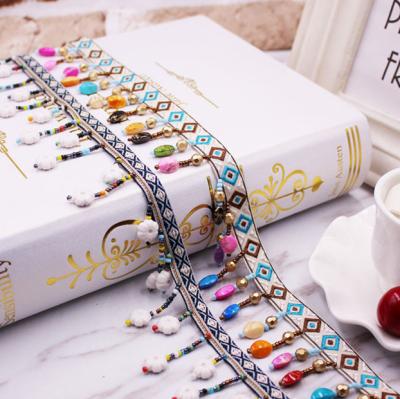 China Viable new style nationality ribbon tassel lace up DIY clothing scarf luggage home textile accessories manufacturers for sale