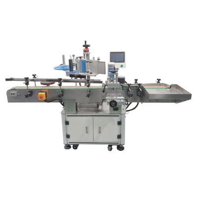 China Food Round Bottle Vertical Rotary Sticker Automatic Positioning Labeling Machine for sale