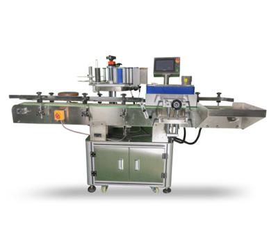 China Automatic Food Rolling And Round Bottle Vertical Rotary Sticker Friction Labeling Machine for sale