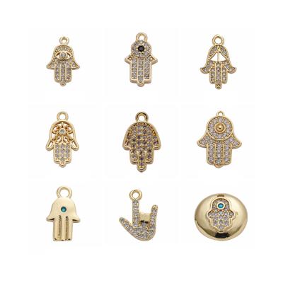 China FASHIONABLE Super Quality Gold Filled Brass Mixed Lucky Charm Pendants Hand Wing Leaf Insect Pattern CZ Pendants For DIY Jewelry Making for sale