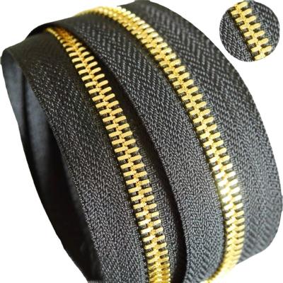 China Viable No Long Chain 5 Metal Zipper Metal Zipper Roll Teeth Custom Gold Zipper For Luggage for sale