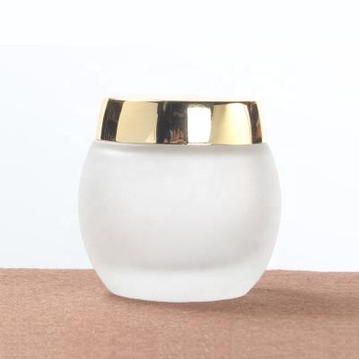 China 100g Cosmetic Round Frosted Glass Cosmetic Cream Jar With Aluminum Lid For Skin Care Cream for sale