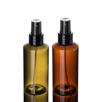 China 100ml 150ml Cosmetic High Quality Green Amber Plastic Spray Bottle With Transparent Cap for sale