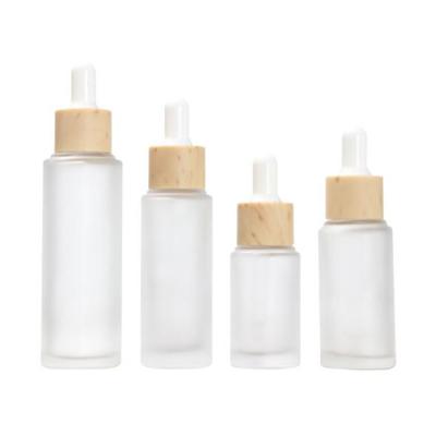 China LOW MOQ 20ml 25ml 30ml 50ml Essential Oil Cosmetic Transparent Frosted Glass Bottle for sale