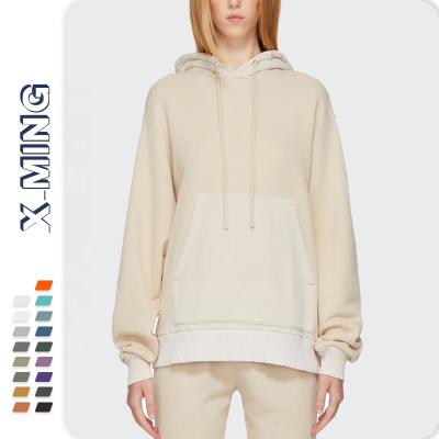 China Fashionable oversized white beige good quality anti-pilling simple lady basic hoodies hem women hoodies pocket pleated sweatshirt large for sale