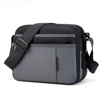 China PORTABLE hot sale fashion men bag business square simple portable bag postman oxford fabric shoulder diagonal match bags retros for sale