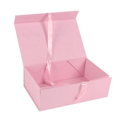 China Recycled Materials Luxury Magnetic Closure Cardboard Paper Wedding Gift Clothes Garment Rigid Hard Packaging With Ribbon for sale