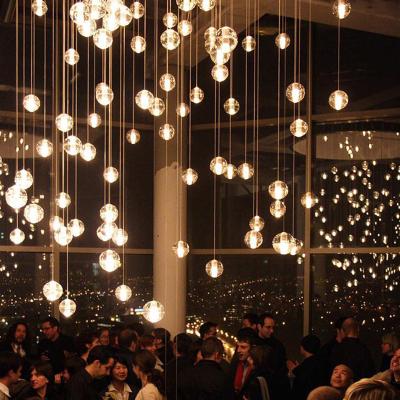 China Modern Raindrop Crystal Bubbles Glass Ball Chandelier Modern LED Staircase Luxury Hotel Villa Chandelier for sale