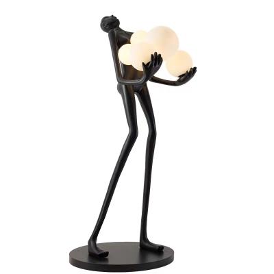 China White Minimalist Abstract Humanoid Statue Floor Standing Lights Art Sculpture Sculpture Holding Ball Lamps Hotel Lobby Ball Lantern Floor Lamps for sale