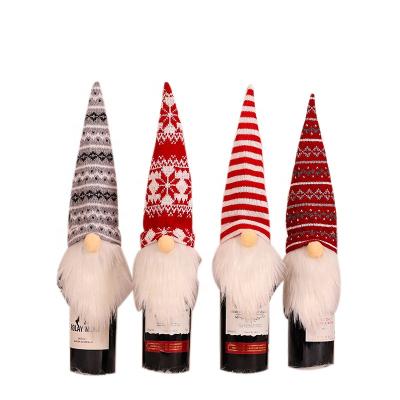 China Cloth Christmas Red Wine Bottle Hat Knit Faceless Gnome Hat Christmas Wine Bottle Cover For Xmas Party Decoration for sale