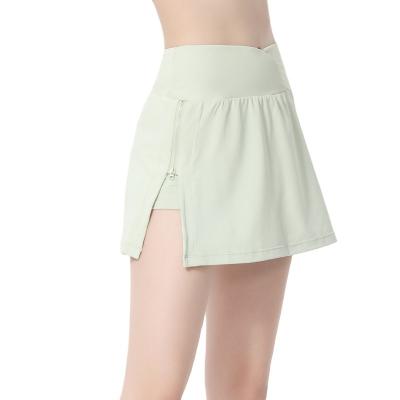 China Breathable Women's High Waisted Pleated Tennis Skirts Lightweight Athletic Workout Running Sports Golf Skorts With Pockets for sale