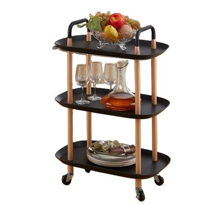 China Living Room Nordic Minimalist Boat Shaped Removable Black Bathroom Shelf Fruit Shelf Mobile Storage Rack for sale