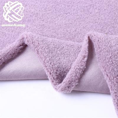 China 2021 Auto Upholstery Fleece Curly Faux Fur Fabric Mutiple Color Teddy Fur Fabric Use For Clothes Upholstery for sale