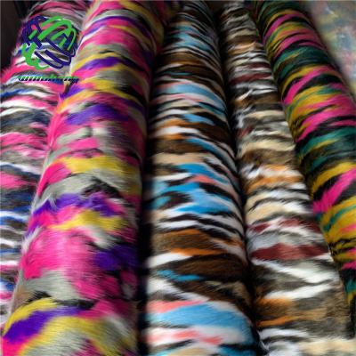 China Wholesale shaggy auto upholstery faux fur fabric by the yard luxury jacquard mix color design faux fur fabric for sale