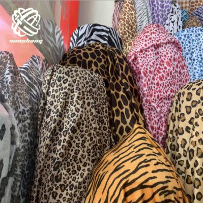 China China Manufacturer Wholesale Super Soft Auto Animal Fur Cheap Upholstery Fabric Leopard Printed Plush Faux Fur for sale