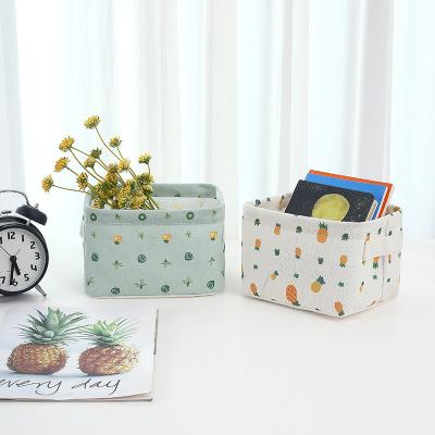 China Nordic Viable Household Style Fabric Sundries Desktop Foldable Square Cosmetic Storage Basket for sale