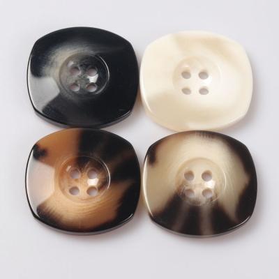 China Large Size 34mm Resin Coat Nickel Free Plastic Button 38mm New Designs Adjust Shape Shinny Brown Color Plastic 4 Holes 44mm Button for sale