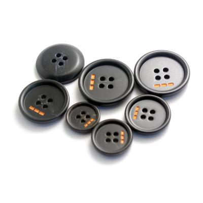 China Yong Ji Factory Wholesale resin button customer washable laser engraved 4 holes polyester button many color for coat for sale