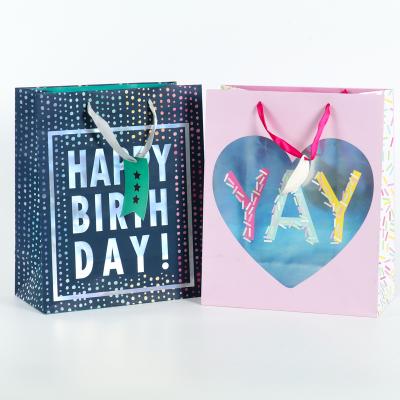 China Custom Made Eco-Friendly Fasion Logo Large Size Birthday Gift Paper Bags With Ribbon for sale