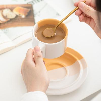 China Retro Two Color Korean Ceramic Water Cup Stocked American Milk Two Color Coffee Cup And Saucer for sale