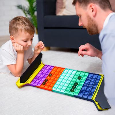 China Developing Intelligence and Sensory Busy Toy Rainbow Popping Game Board Relaxing Silicone Relaxation with Dies Push Bubble Chess Board Busy Person Board Game for sale