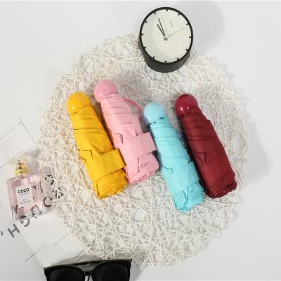 China High quality waterproof and sunproof good compact 5 fold capsule mini foldable umbrella with plastic case for sale