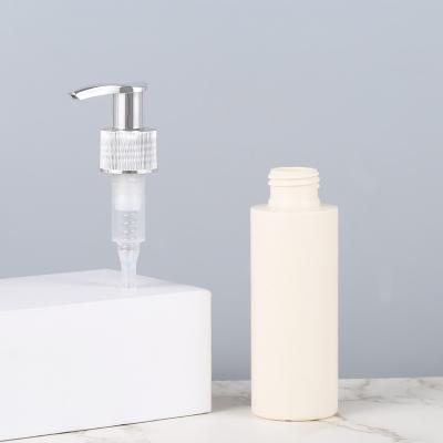 China Non Spill Luxury Silver Lotion Pump 28410 Matte Lotion Pump Dispenser Head For Cosmetic Bottle for sale