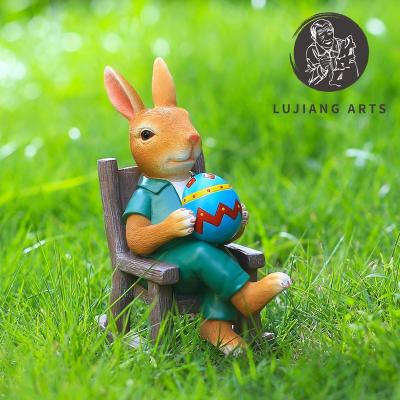 China European Garden Bunny With Easter Egg Rocking Chair Decorations Spring Ornament Easter Bunny Decors Resin Figurines Holiday Gifts for sale