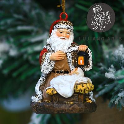 China Europe Christmas Tree Decoration Santa Ornament Figurine Christmas Gift Resin Ornament for sale