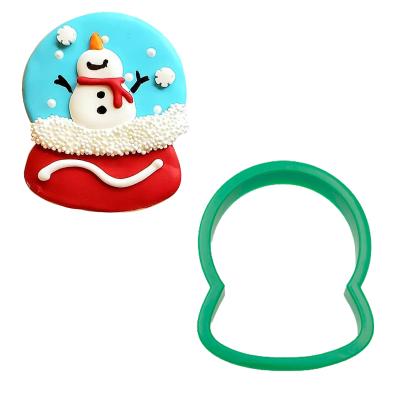 China Sustainable Plastic Christmas Large Snowglobe Shaped Cookie Cutter With Sweet Sugar Cookie Royal Frosting Icing for sale