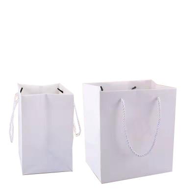 China Recyclable Custom Print Logo Gift Paper Bags Luxury  Paper Shopping Bag With Ribbon Handle for sale